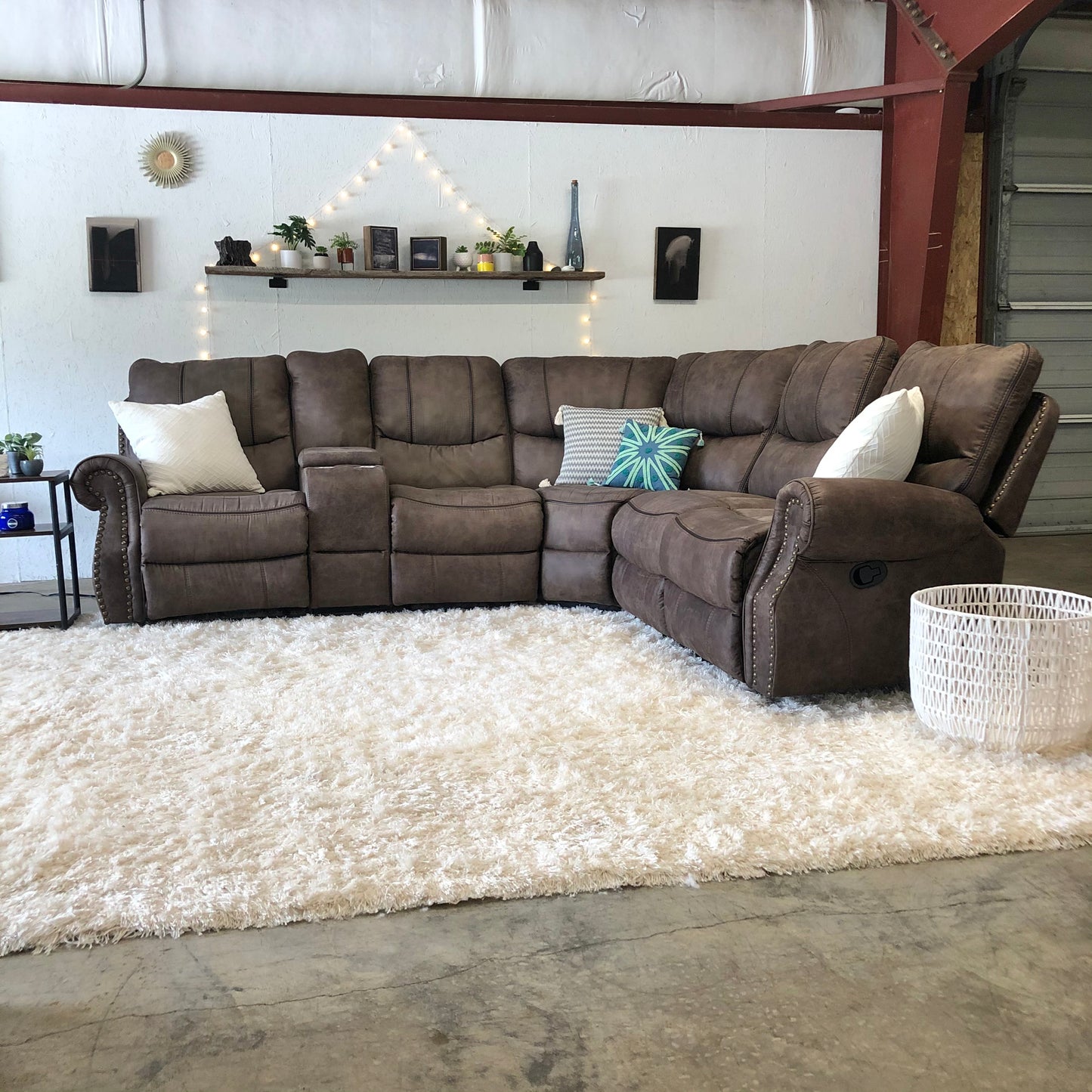 Studded Reclining Sectional w console outlets Delivery